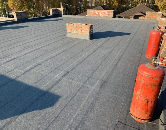 Плоская кровля дома